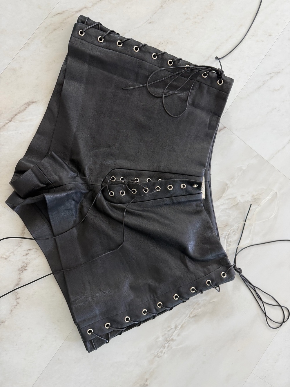 House of CB - AZORA
Black Vegan Leather Micro Mini Shorts